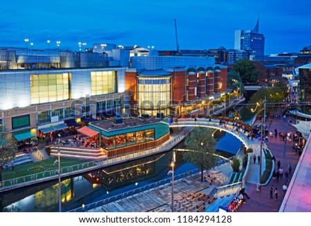 Aerial view of the 'Oracle' shopping centre illuminated at dusk in Reading, Berkshire uk Royalty-Free Stock Photo #1184294128
