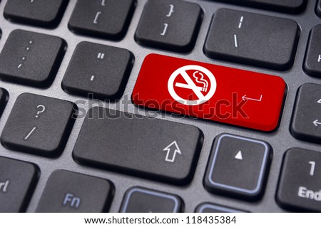 a no smoking sign on keyboard enter key, to convey anti smoking concepts in workplaces or offices.