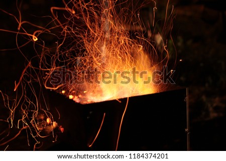 sparks from the barbecue