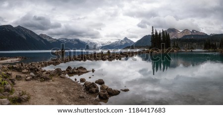 Beautiful landscape view of a Glacier Lake during a vibrant cloudy summer day. Taken in Garibaldi Provincial Park, located near Whister and Squamish, North of Vancouver, BC, Canada.