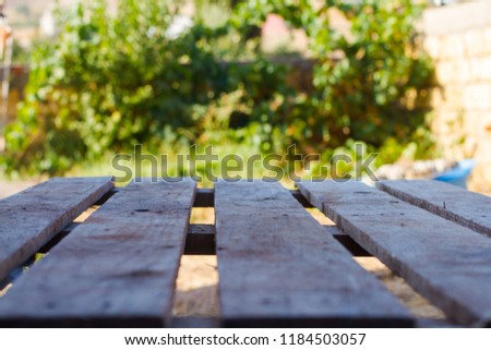 Image of selective focus on surface of wood table and Abstract blur image .background usage.