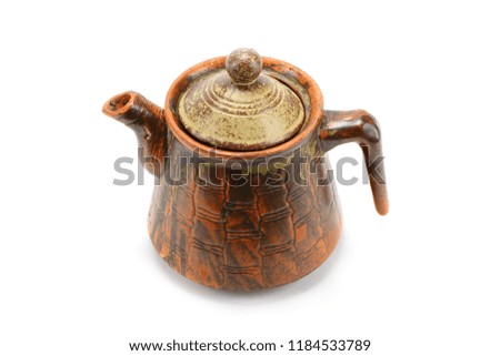 Antique stone tea pot on white background