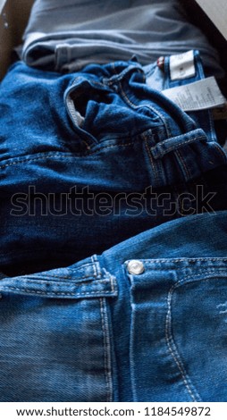 Denim trousers jeans pants drawer folded