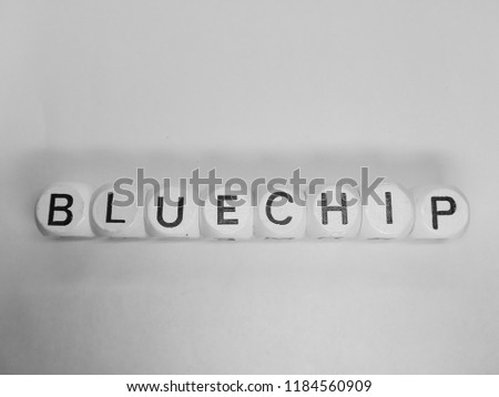 word blue chip spelled on dice