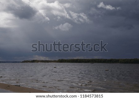 Volga river beach dark clouds, Samara city