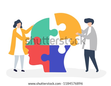 People connecting jigsaw pieces of a head together Royalty-Free Stock Photo #1184576896