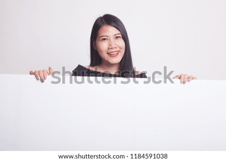 Young Asian woman with blank sign on white background