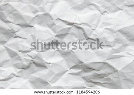 White background and wallpaper by crumpled paper, White crumpled paper texture with empty and free space for text, Background by scruffy paper texture and detail.
