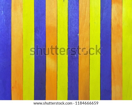 Colorful ice cream sticks background. wooden texture. ideal as wallpaper and backdrop.