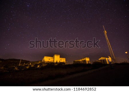 Communications tower and stars Nightscape in Valbona Spain
