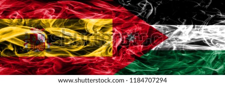 Spain vs Jordan smoke flags placed side by side. Thick colored silky smoke flags of Spanish and Jordan