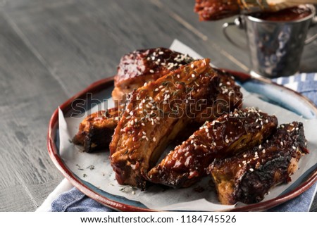Tasty barbecued ribs seasoned with sesame and spicy sauce