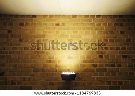 the surface mounted wall uplight with the front guard performs uplight to the ceiling with the wart CRT 2700K Royalty-Free Stock Photo #1184769835