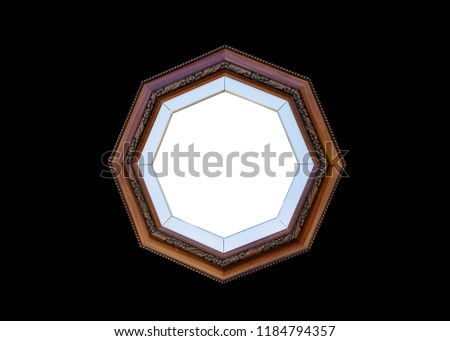 Picture frame is octagon with pattern pad. Abstract pattern isolated on black background.