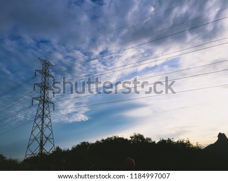 High voltage towers with beautiful sky in the evening space background for text.