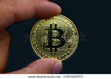 bitcoin hold with fingers, isolated