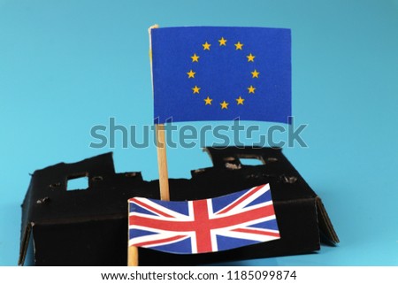 A great britain leaving europe union and starting action on own hand. Blue background