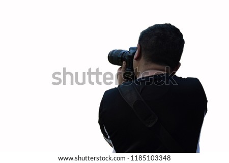 photographer takes a look from the back, on a white background