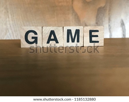 Word Game written with wood cubes