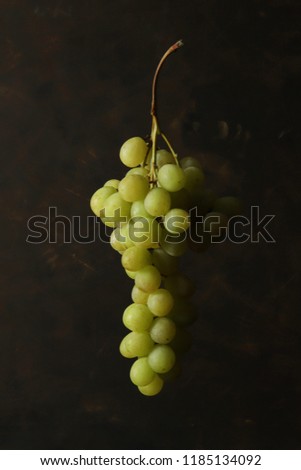 fresh grapes on a black background