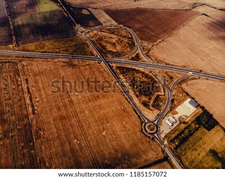 Aerial view of highway interchange of a small city open space