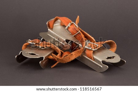 Very old dutch ice skates for a small child, isolated