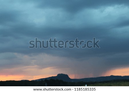 heavy cloud stormy moods scene landscape burning sky
