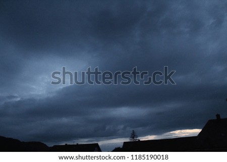 dark dangerous gray sky cloudy stormy evening