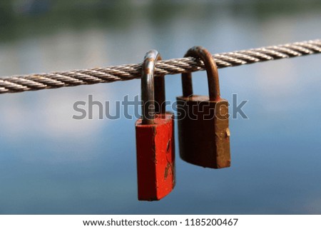 two locks love forever bridge water background