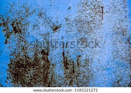 blue rusty worn background with dark texture and patterns