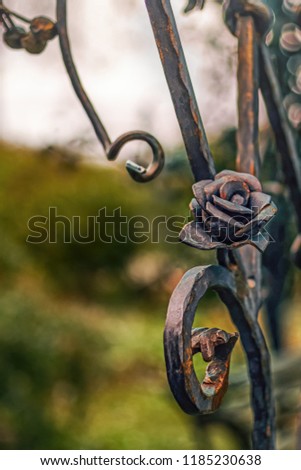 Beautiful forged rose from metal closeup