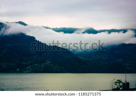 Pokhara Nepal September 18, 2018 View of clouds on the top of the Phewa lake in the evening