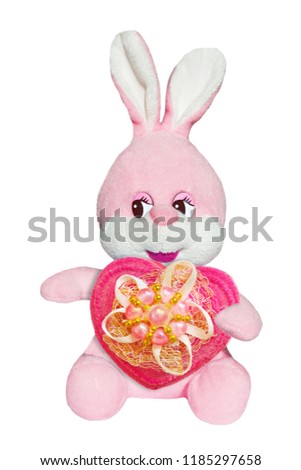 Soft toy pink Bunny with blue scarf isolated on background with heart