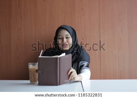 Study concept. young girl relax with her book to read and study early in the morning