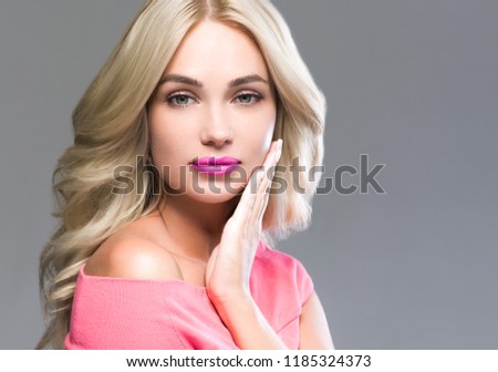 Beautiful blonde hair woman with long lashes beauty eyes 