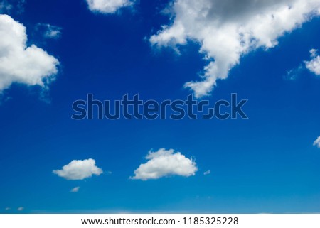 Fresh sky is bright blue and white clouds clean and soft On a nice day during the hot summer season. a copy space to put a message, Idea. The feeling of the weather is fresh, calm.