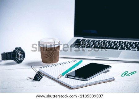 plenty modern business tools on a white wooden background
