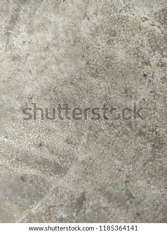 Deposition of Organic matter in the form of thread like fibres and grains on Concrete surface. The formation of this pattern is made on the Organic farming Concrete floor. Grunge on Concrete surface. 
