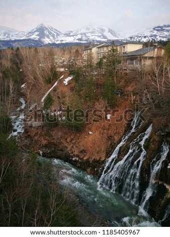 Shirahige Waterfall. Kamikawa District, Biei, Hokkaido, Japan. chilling with cold breath.