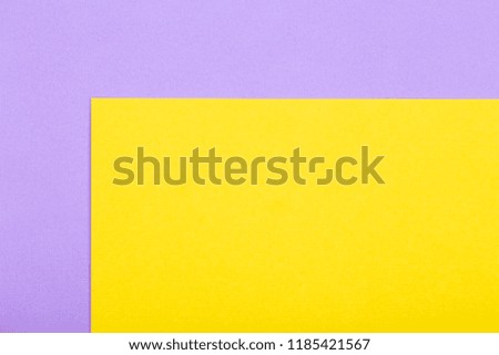 Geometric paper background of yellow and purple colors. Mockup for flat layout compositions