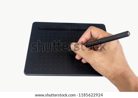 Hand of graphic designer working with stilus and tablet
