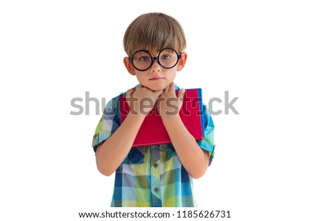 Child wearing glasses with book isolated on white background. A 