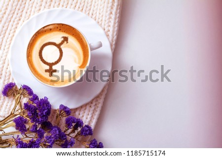 symbol of gender equality on milk foam coffee cups cappuccino