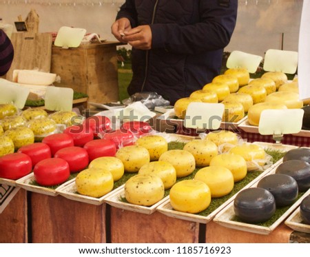 Selection Of Dutch Cheeses For Sale On Stall