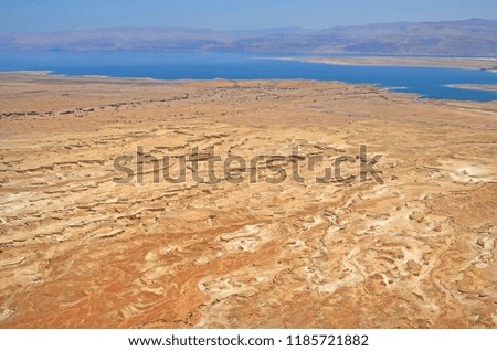 view from the height of the dead sea in Israel and the mountains of Jordan. the formation of karst trenches in the Judean desert.