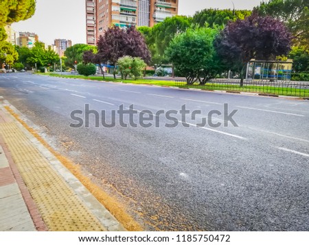 A photo of the famous Arturo Soria street, in Madrid, the capital of Spain, in Europe. The photo was taken early in the morning of a lovely summer day near the intersection with San Luis street.
