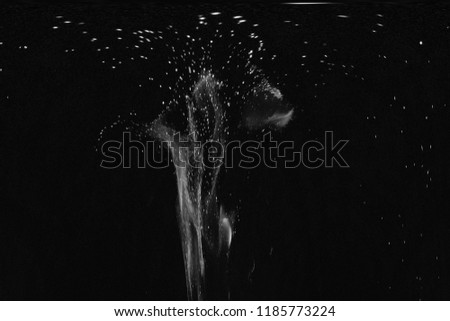 sparks of fire on a black background at night