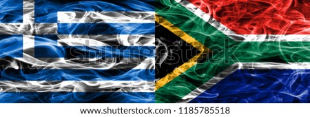 Greece vs South Africa smoke flags placed side by side. Thick colored silky smoke flags of Greek and South Africa