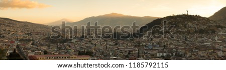 Panorama of a panoramic view of Quito, Ecuador during sunset Royalty-Free Stock Photo #1185792115
