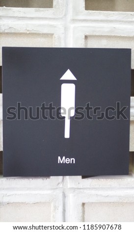 this is toilet for men. the figure show a man with hat like sakkat (vietnamese hat)